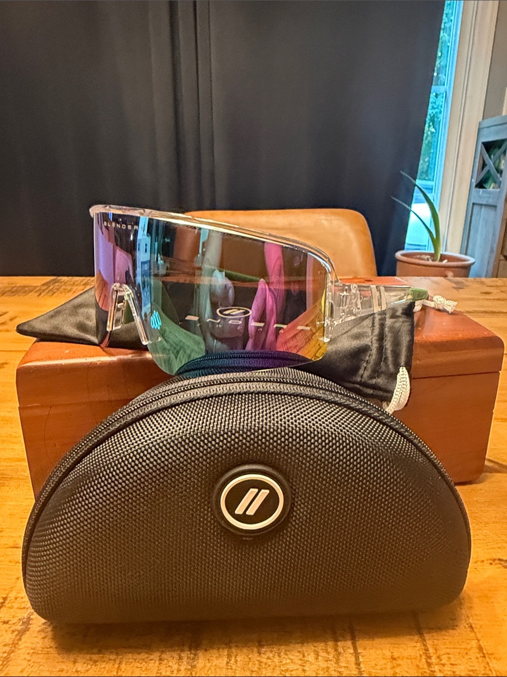 Blenders Polarized Sunglasses Purple iradescent lens with Green stems.